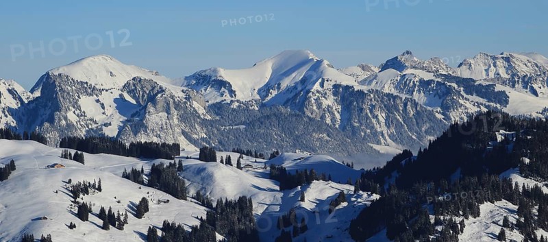 Snow covered mountain ranges seen from Horeneggli