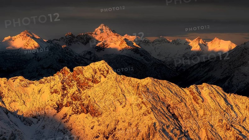 Mountains around Plansee in Reutte Tyrol in winter with snow at sunrise