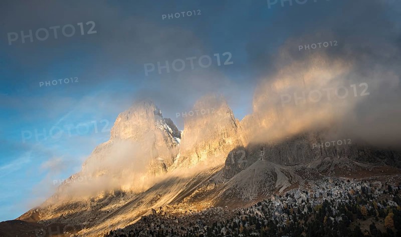 Foggy mountain landscape of the picturesque Dolomiti at Passo Sella area in South Tyrol in Italy