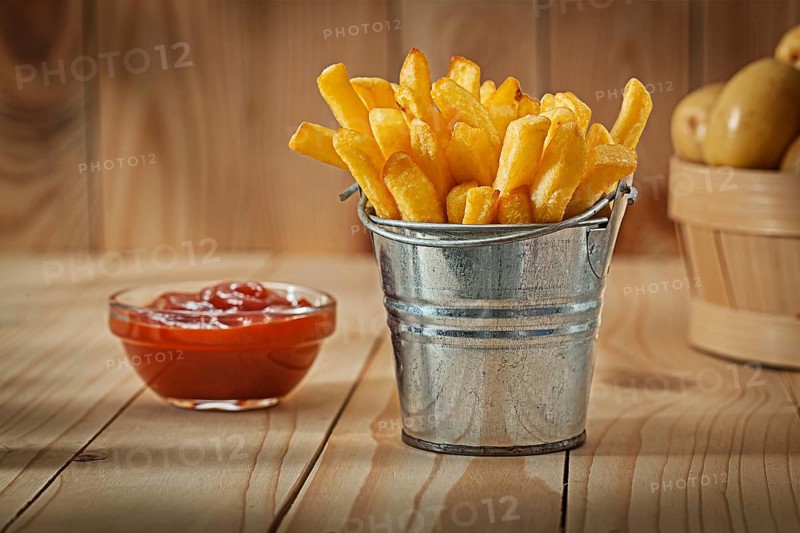 Fries Of Potato In Stilised Metalick Bucket Ketchup And Whole Potato