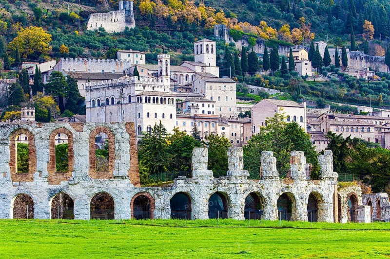 Roman amphitheater built two thousand years ago. Magnificent Renaissance palace. The city of Gubbio in the Umbrian mountains. Winter cold and windy day. Italy