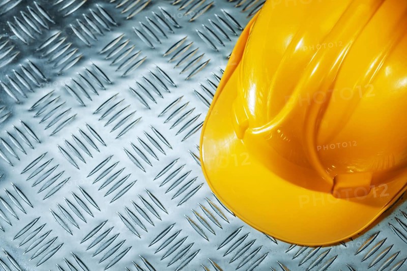 Hard hat on corrugated metal sheet