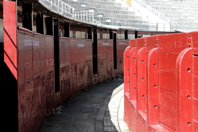 Madrid, Spain, Europe, Narrow entrances in the arena with red walls and names of the areas, Las Ventas Bullring, Europe