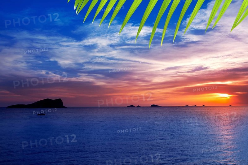 Ibiza cala Conta Conmte sunset with bledas and esparto islands