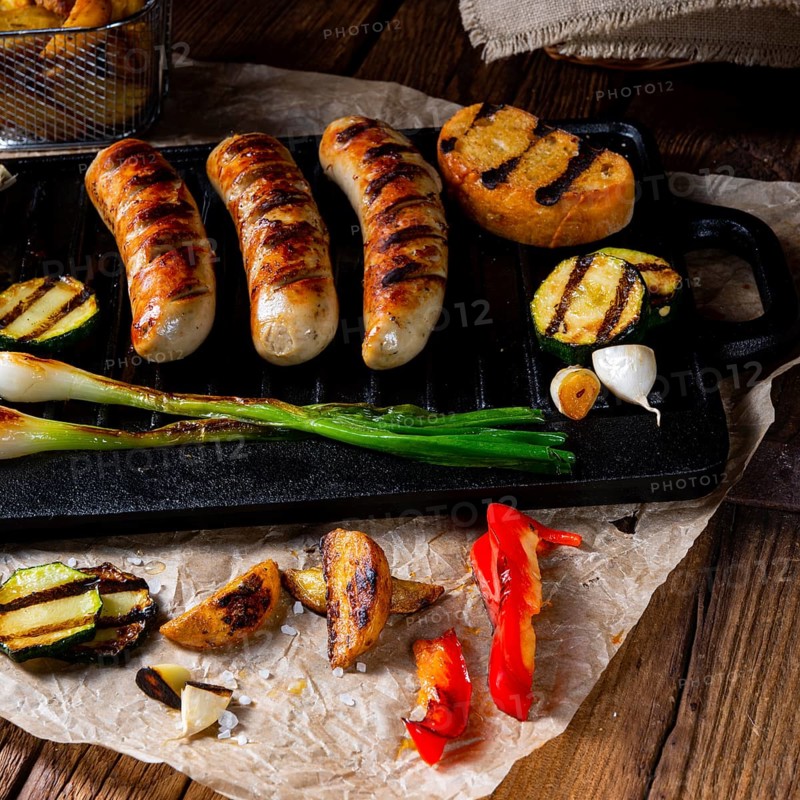 Delicious grilled sausage with various grilled vegetables