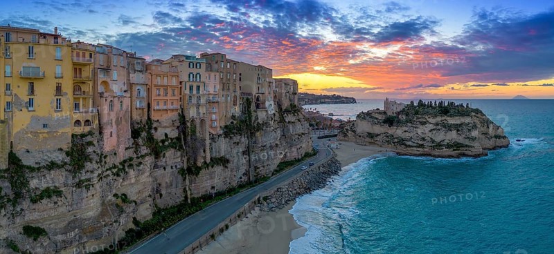 Tropea, Italy, 16 December, 2023: panorama view of Rotonda Beach and the colourful old town of Tropea in Calabria at sunsetview of Rotonda Beach and the colourful old town of Tropea in Calabria, Europe