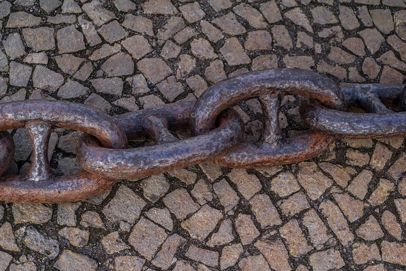Old, rusty harbour chain
