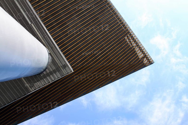 View up the pillar to the top of the roof