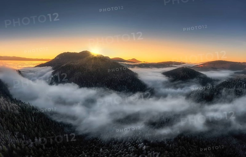 Fog over the Liptov village of Velke Borov before sunrise in Slovakia