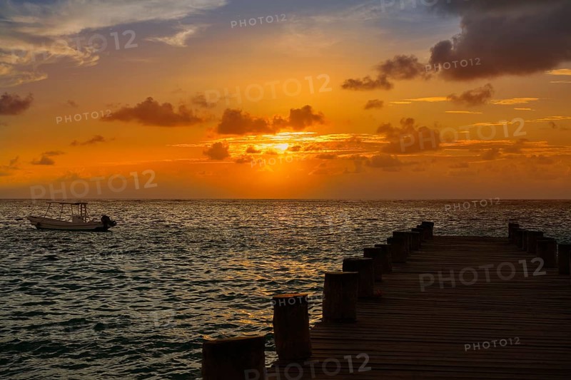Riviera Maya pier sunrise in Caribbean Mayan Mexico