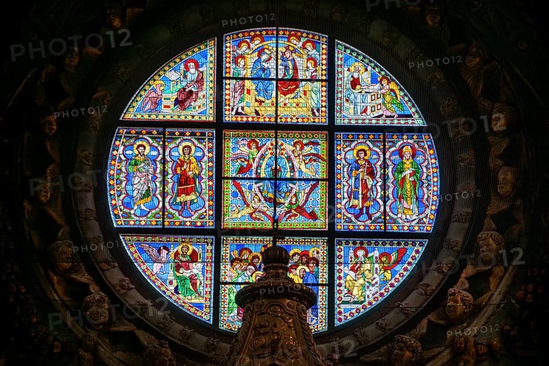 SIENA, ITALY, SEPTEMBER 23, 2023, Rich ornate window with mother mary above the presbytery of the Siena cathedral in Italy