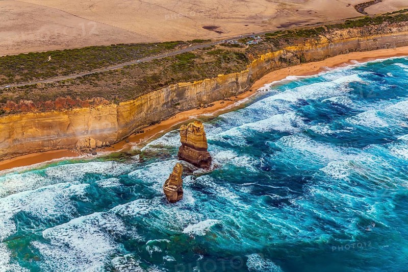 Gorgeous Ocean Turquoise Surf. Helicopter flight. Australia. The Twelve Apostles and Great Ocean Road. The concept of extreme, active and photo tourism
