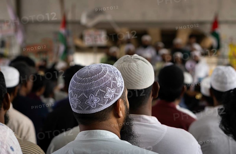 07 April 2025- Gazipur, Bangladesh: The general public, many of whom are wearing traditional Muslim prayer hats, have gathered for a rally or demonstration in support of the Palestinians