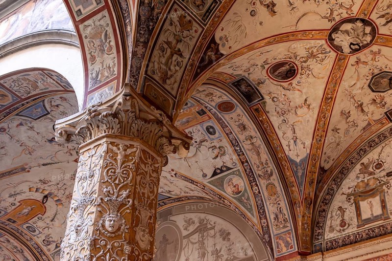 Wall frescoes of rich decorated courtyard of Palazzo Vecchio in Florence, Italy, Europe