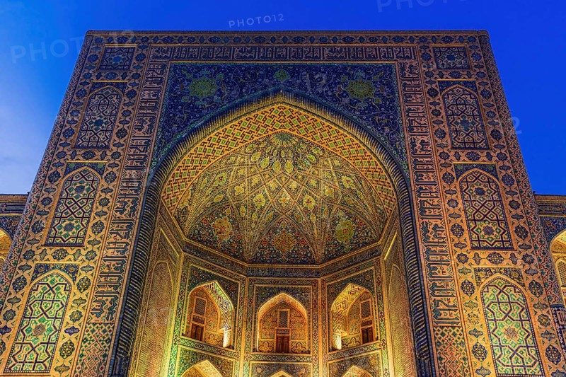 Tilya-Kori Madrasah with lights on Registan square