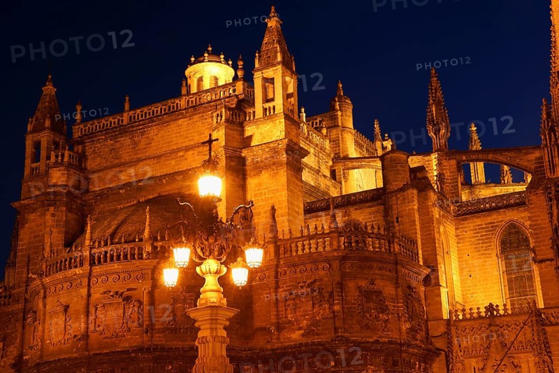 Detail of the gothic and baroque Cathedral of Seville in Spain by night