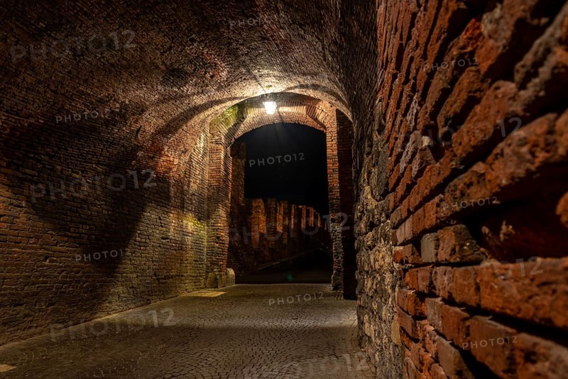 Medieval Passage to the old Castelvecchio Bridge over the Adige River at Night, Verona, Italy, Europe