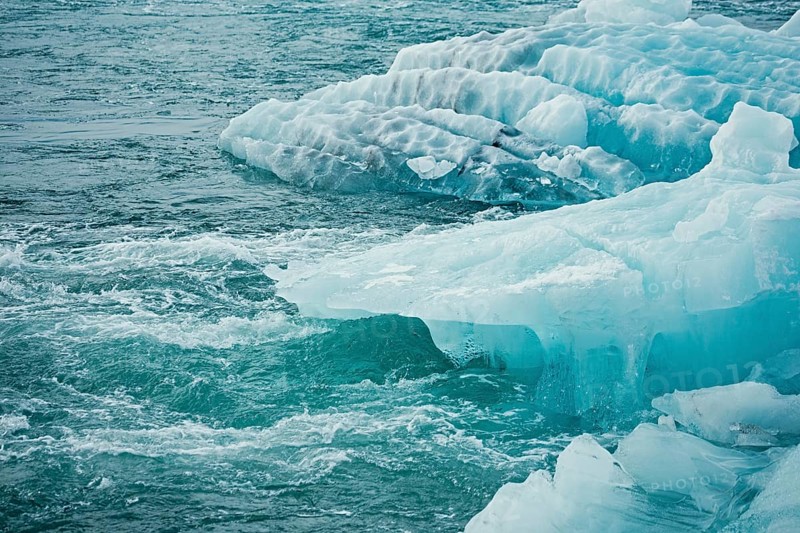 Blue icebergs floating in a cold, tranquil ocean scene, iceberg, glacier, snow, ice rock, ice diamont, glacier lagoon, nature, snow, diamont beach, Iceland, Europe