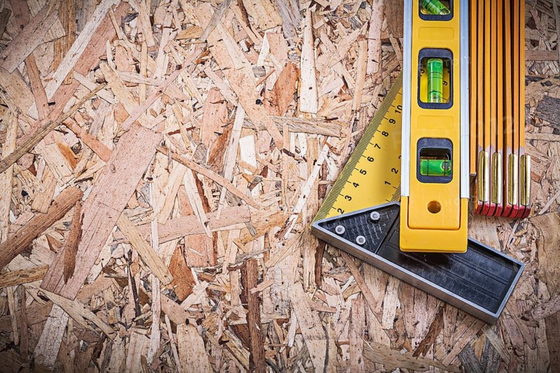 Square ruler construction level wooden meter on OSB