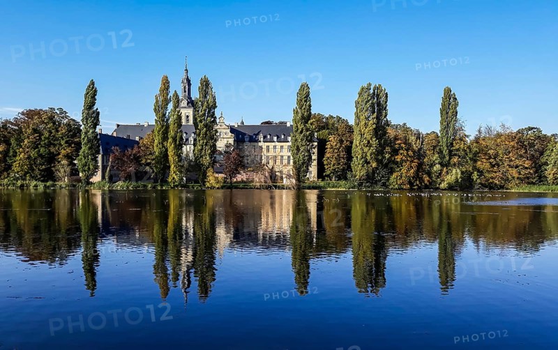 The Abbey of the Park reflecting in the pond in Leuven, Belgium, Europe