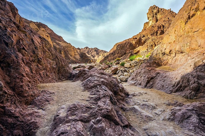 Israel in January. The picturesque Black canyon in ancient Eilat mountains