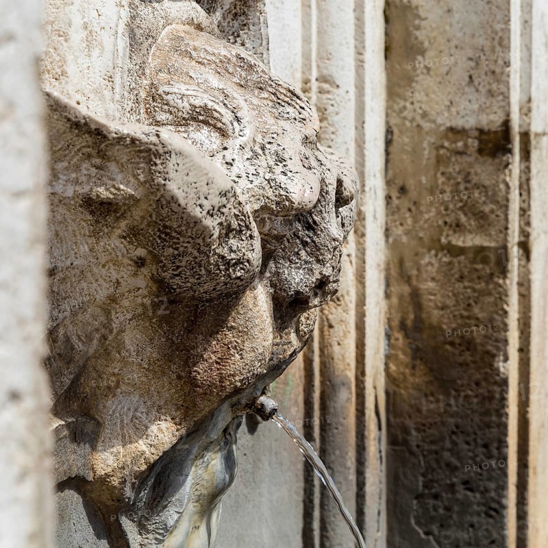 Detail of an ancient fountain in Spoleto Italy