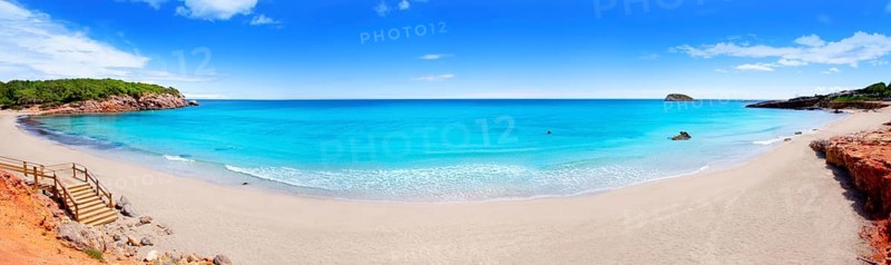 Cala Nova beach in Ibiza island panoramic with turquoise water in Balearic Mediterranean
