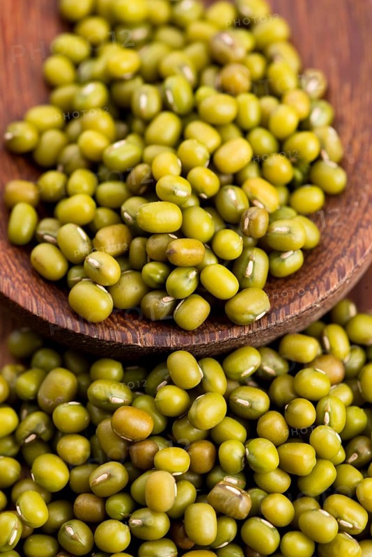 Mung beans over wooden spoon, lodz, poland