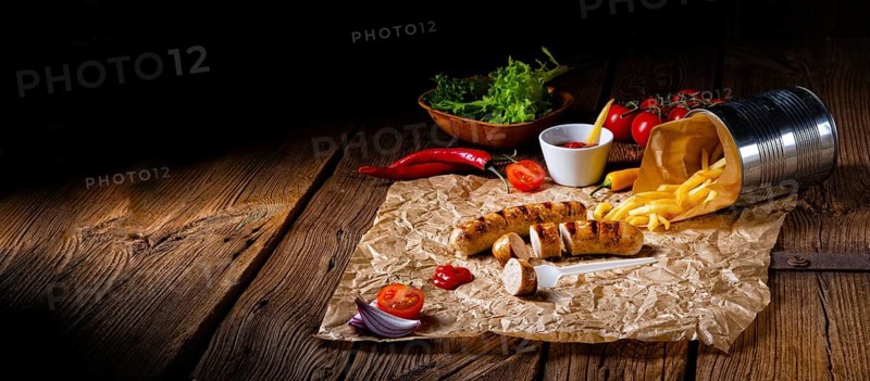 Rustic bratwurst with pommes and hot ketchup
