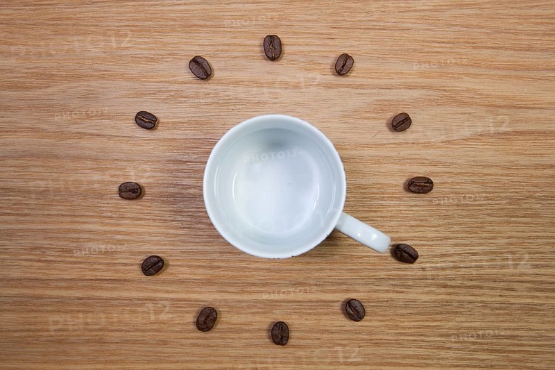 Coffee Time - Empty coffee cup and clock of coffee beans
