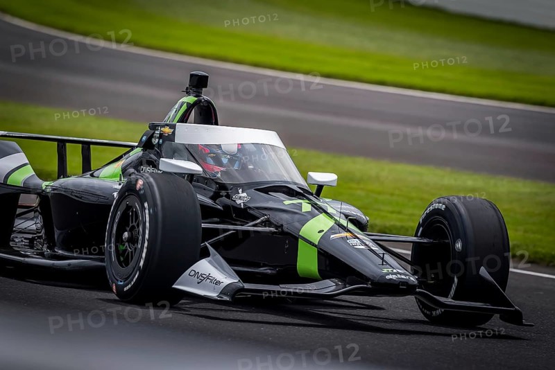 ROMAIN GROSJEAN (77) of Geneva, Switzerland comes off turn 3 during a practice for the 108th Running of the Indianapolis 500 at the Indianapolis Motor Speedway in Speedway, IN