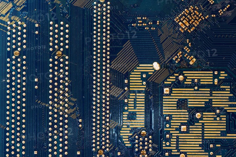 Detail of the back of a motherboard. Circuits and welds