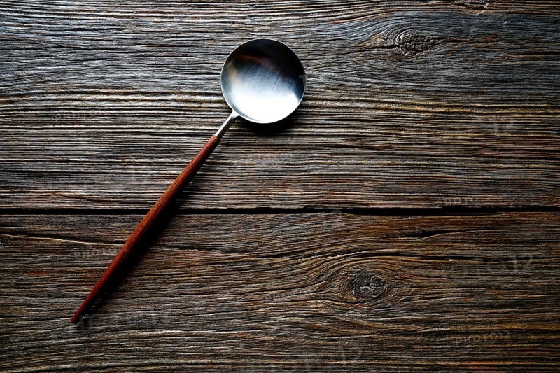 Kitchen tools spatule kitchenware on wooden background