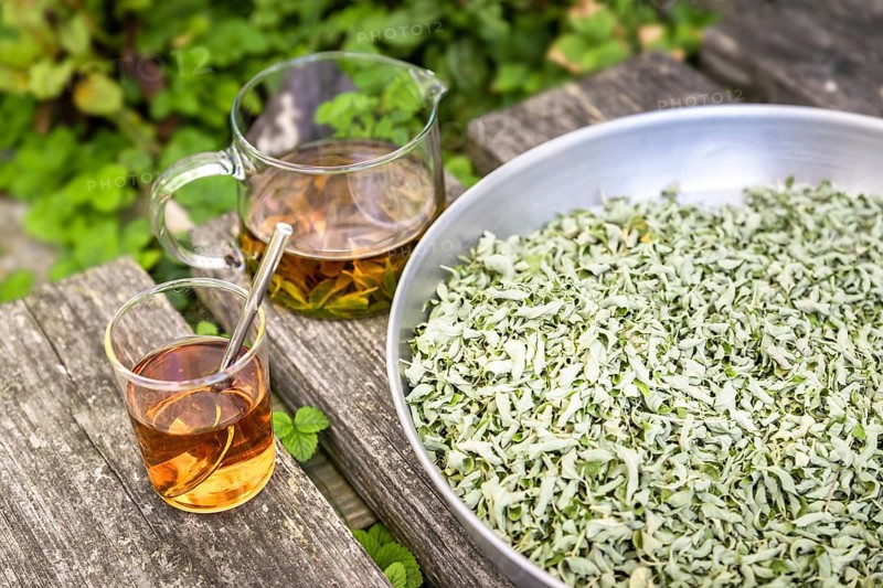 A verbena tea on old wooden planks