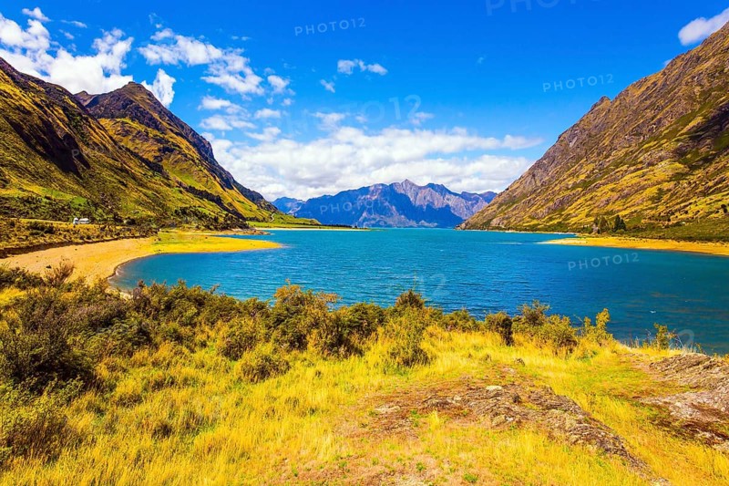 Great trip to a fabulous country. Huge Hawea Lake with turquoise smooth water. The steep slopes of the mountains descend into cold water. The concept of ecological, active and photo tourism