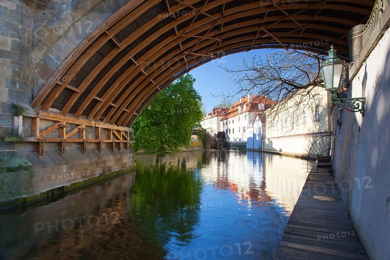 Kampa Island, also known as Venice of Prague, in the Mala Strana, the old houses are reflected in the narrow river Devil (Czertovka). The old watermill .Czech Republic, Prague