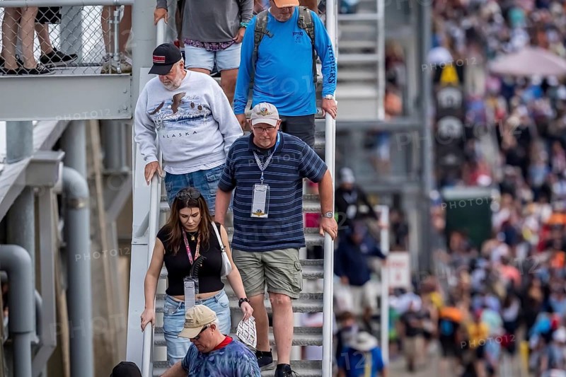 Fans depart the Indianapolis Motor Speedway after seeing JOSEF NEWGARDEN (2) of Nashville, Tennessee win the 108th Running of the Indianapolis 500 in Speedway, IN