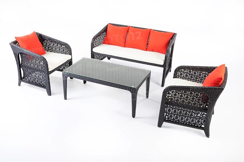 Suite of wicker furniture made of synthetic fibre on isolated background