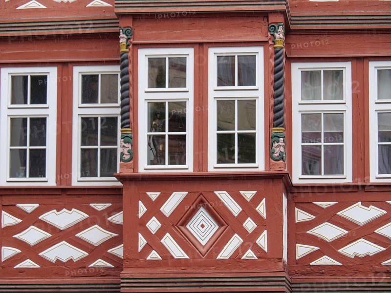 Half-timbered façade with red struts, spiral columns and decorative geometric patterns, Mainz, Rhineland-Palatinate, Germany, Europe