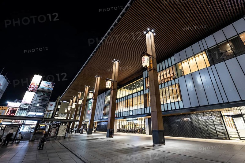 NAGANO, JAPAN - SEPTEMBER 17 2024: The beautiful architecture of Nagano Train Station at night in Nagano, Japan, Asia