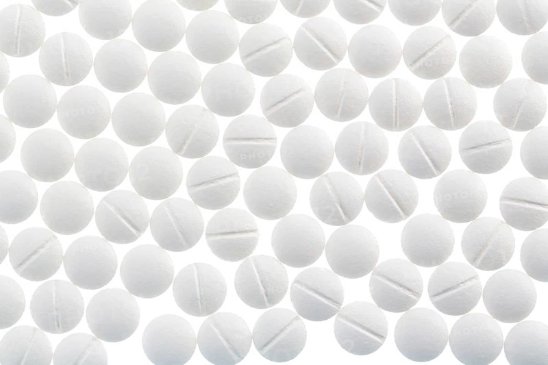 White tablets, symbolic photo for medicine, remedies and tablet addiction