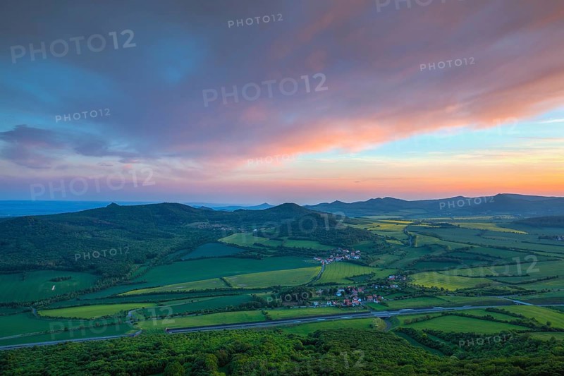 Sunset in Central Bohemian Highlands, Czech Republic. Central Bohemian Uplands is a mountain range located in northern Bohemia. The range is about 80 km long