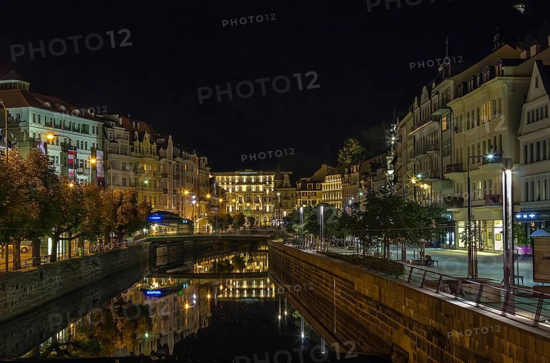 Embankment of Tepla river in the center of Karlovy Vary in evening, Czech republic