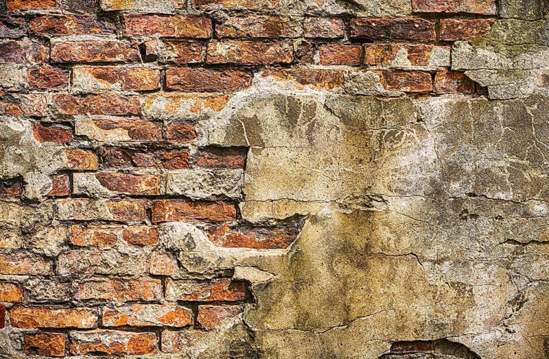Vintage red rendered brick wall pattern background