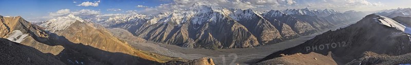 Scenic panorama of Engilchek glacier in picturesque Tian Shan mountain range in Kyrgyzstan
