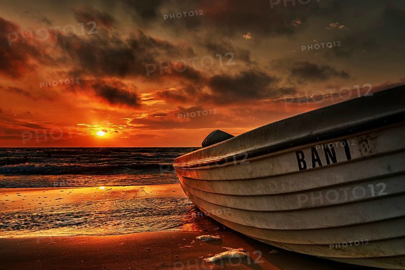 Fishing boat at sunrise in the seaside resort of Bansin on the island of Usedom