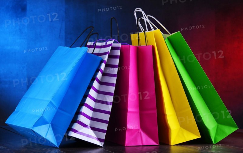 Composition with colorful paper shopping bags