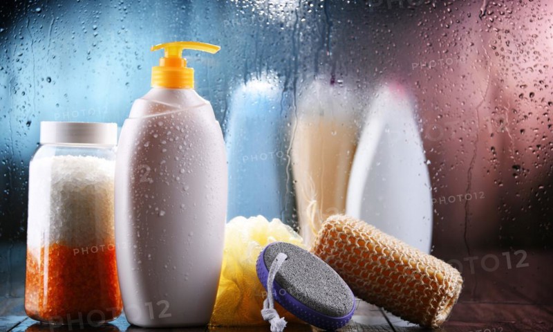 Different containers of body care products in the bathroom