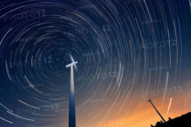 Wind turbines against the night sky