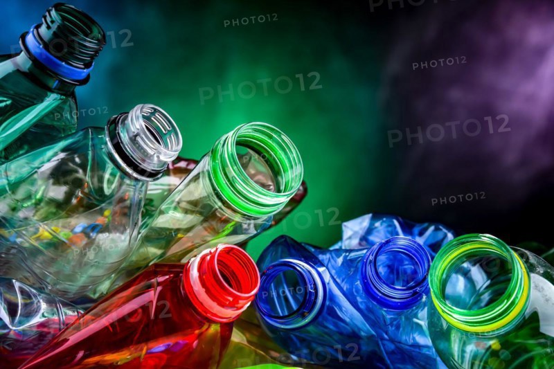 Empty colored drink bottles. Recyclable plastic waste